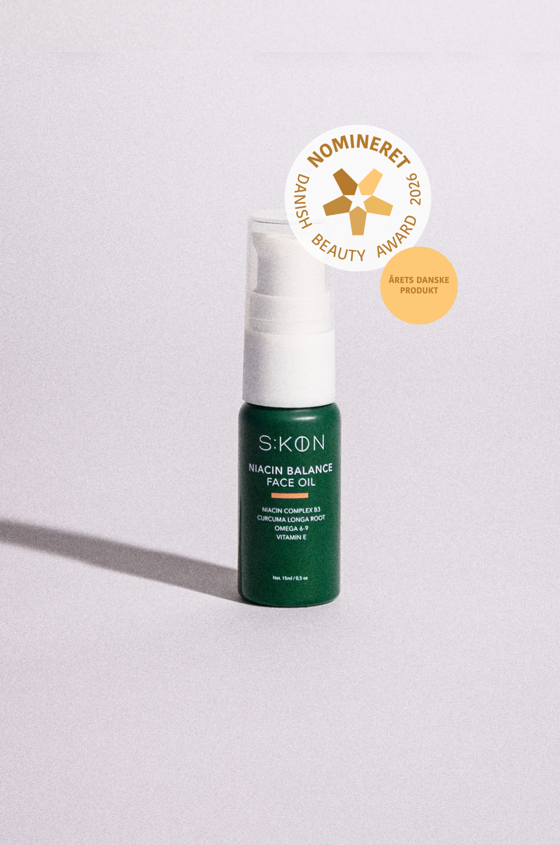 SKON Niacin Balance Face Oil bottle with an award badge on a light gray background